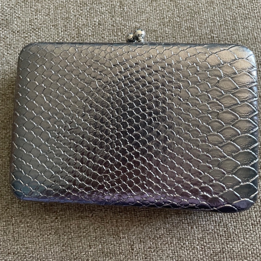 Charming Charlie silver clutch NWT